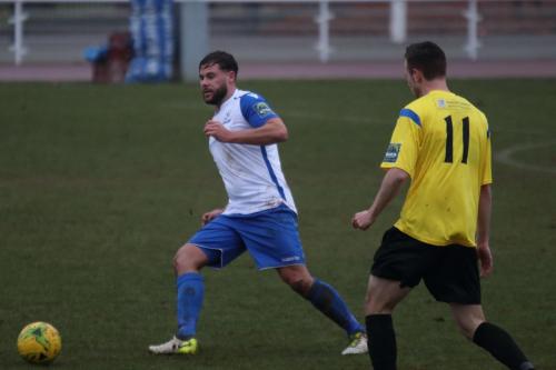 Enfields Adam Martin (L) and Kingstonians Greg Cundle