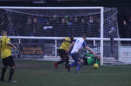 Enfields Brad Wadkins (9) and Kingstonians Andrew Musungu battle for the rebound after Rob Tolfreys initial save