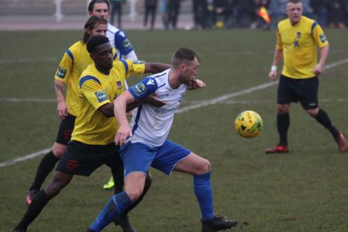 Enfields Brad Wadkins (white) challenges by Freddy Yao