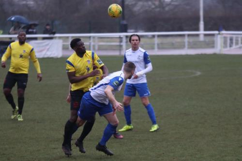 Enfields Brad Wadkins (white, L) and Sam Youngs and Kingstonians Freddy Yao and Rob Bartley (L)