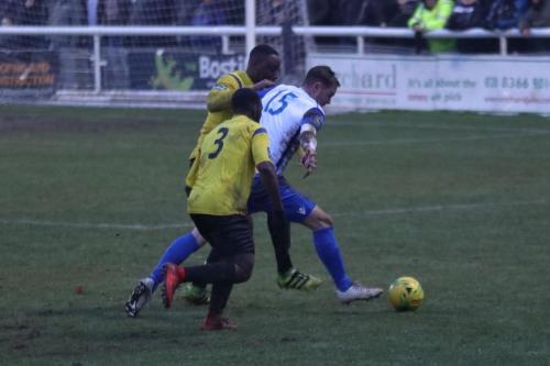 Enfields Liam Hope challenged by Rob Bartley and Andrew Musungu (3)