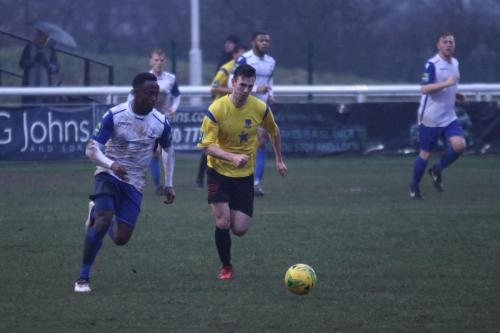 Enfields Ryan blake (L) and Kingstonians Greg Cundle
