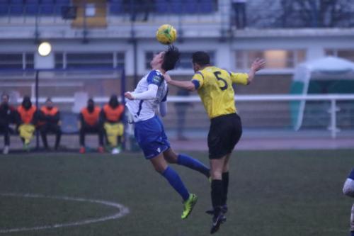 Enfields Sam Youngs (L) and Kingstonians Mark Phillips