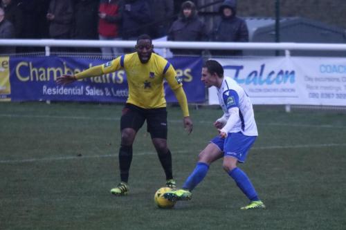 Enfields Sam Youngs (R) and Kingstonians Rob Bartley