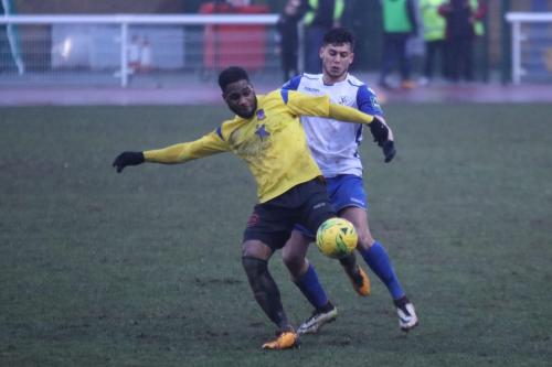 Enfields Samir Bihmoutine (R) and Kingstonians Andre McCollin