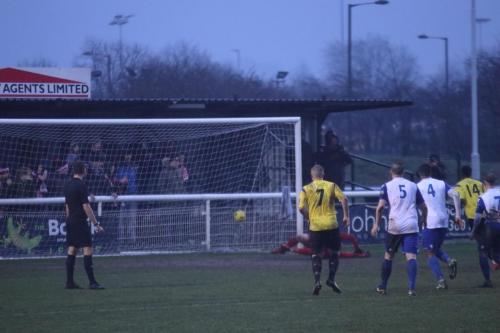 Kingstonians Jerry Amoo (14) completes the scoring with a late penalty