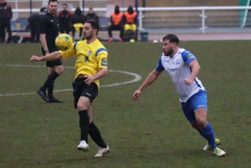 Kingstonians Michael West (L) and Enfields Adam Martin