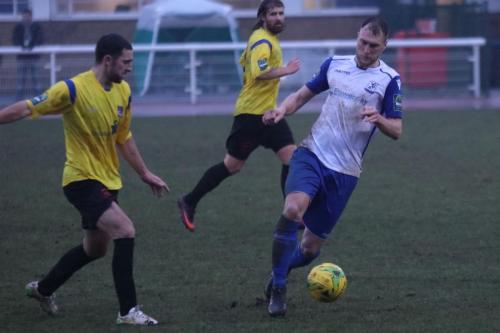 Kingstonians Michael West (L) and Tom Beere and Enfields Brad Wadkins