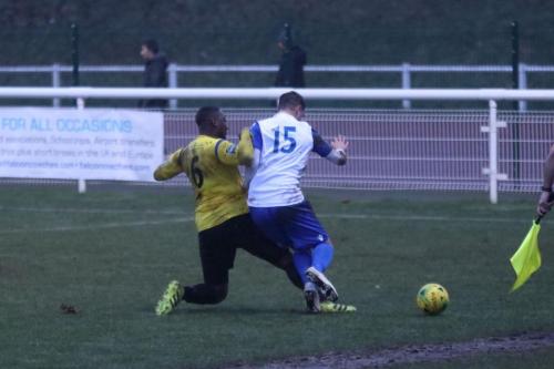 Kingstonians Rob Bartley challenges Liam Hope (15)