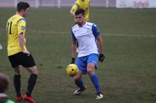 Kingstoninans Greg Cundle (L) and Enfields Samir Bihmoutine