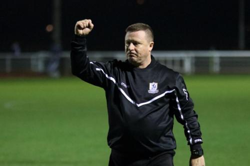 Enfield manager Andy Leese salutes the supporters