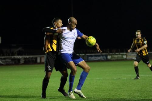 Enfields Simon Thomas shields the ball from Alex Wynter