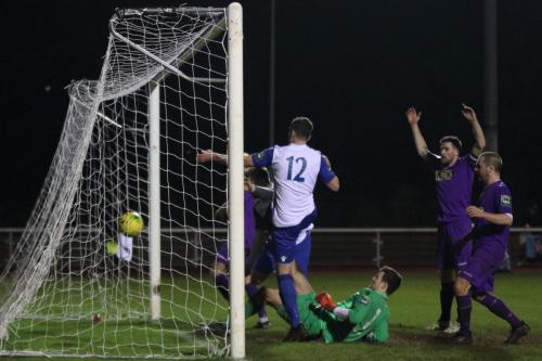 After Matte Piersons fumble Liam Hope (obscured by no 12 Sreve Wales) equalises for Enfield