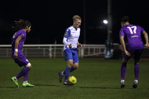 Enfields Ryan Blaqckman and Tootings Dominic Morgan-Griffiths (L) and Danny Bassett