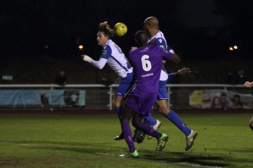 Enfields Sam Youngs (L) and Simon Thomas and Tootings Quincy Rowe