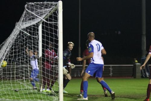 Elliot Benyons shot finds the net off Ahmet Rifat to give Enfield the lead