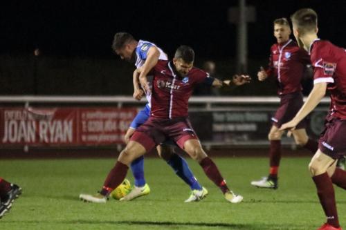 Enfields Adam Martin (white) and Wingates Ahmet Rifat