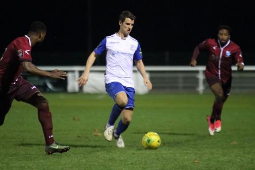 Enfields Elliot Benyon and Wingates Ola Williams (L)  and Reece Beckles-Richards