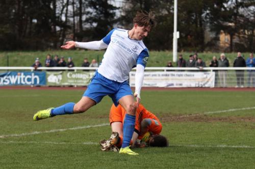 Brightlingsea keeper James Bradbrook saves from Sam Youngs