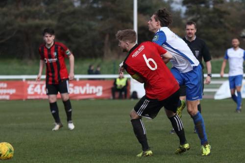 Brightlingseas Matt Cripps (6) and Enfields Sam Youngs