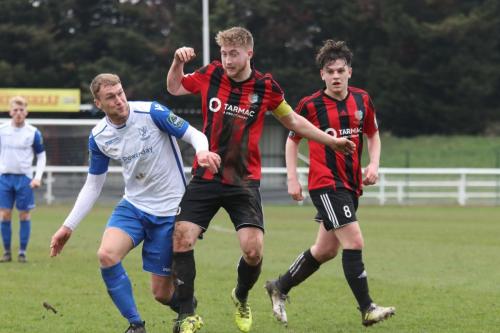 Enfields Brad Wadkins and Brightlingseas Matt Cripps and Thomas Dunningham (R)