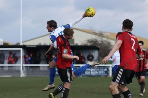 Enfields Liam Hope and Brightlingseas Matt Cripps and George Keys (R)