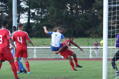 Enfields Dan Rumens (7) heads wide