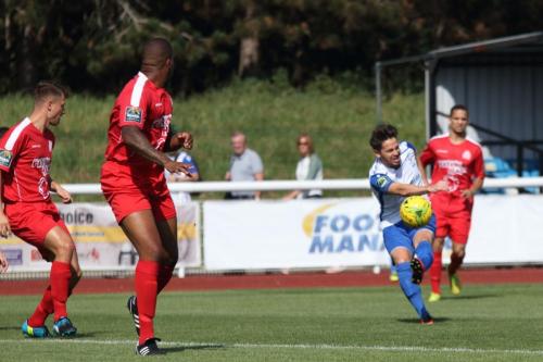 Enfields Drew Roberts sends an early shot just off target