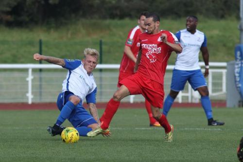 Enfields Ryan Blackman (white) challenges Michael Bryan