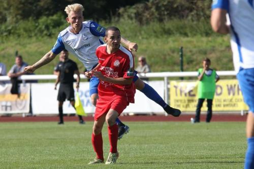 Enfields Ryan Blackman  (white) and Harrows Michael Bryan