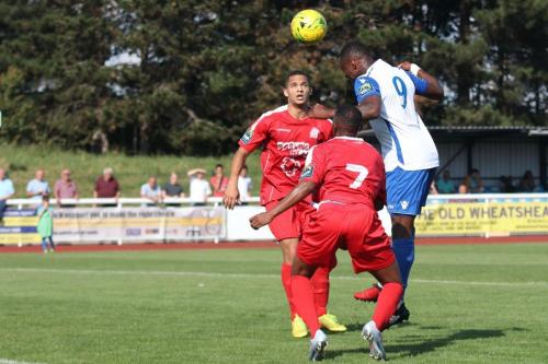 Enfields Ryan Blake (9) sends a header across the face of goal