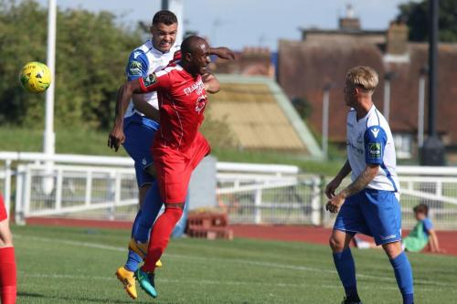 Enfields Taylor McKenzie (L) challenges Richard Pacquette