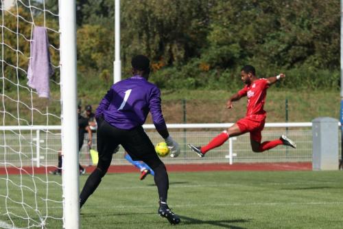 Harrows Howard Hall tries to block a cross