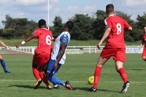 Harrows Kurtis Cumberbatch (6) clears from Ryan Blake