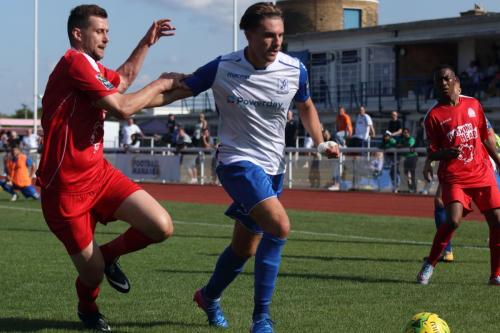 Harrows Mark McLeod (L) and Enfields Sam Youngs