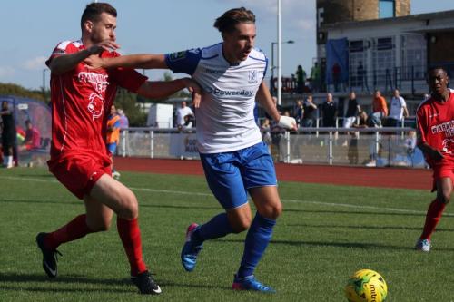 Harrows Mark McLeod (L) and Enfields Sam Youngs105