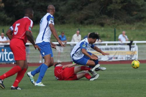 Harrows Mark McLeod (red) challenges Mario Noto