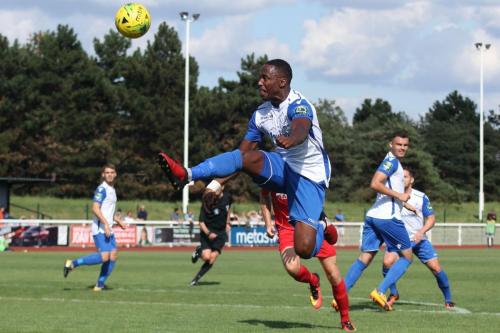 Ryan Blake (Enfield) stretches for a high ball