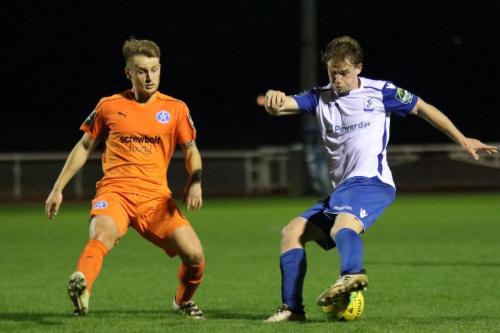 Enfields Aaron Greene (R) and Leistons Byron Lawrence