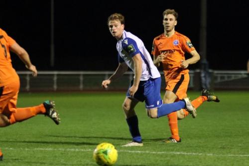 Enfields Aaron Greene (white) and Leistons Dominic Doherty