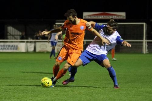 Enfields Drew Roberts (R) challenges Joe Marsden