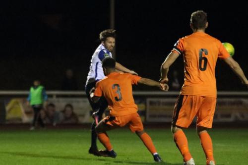 Enfields Drew Roberts and Leistons Seb Dunbar (3) and Tom Bullard