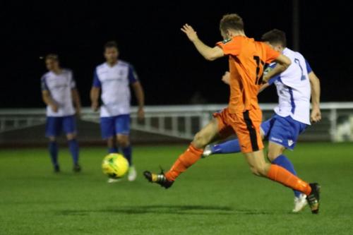 Enfields John Kyriacou (R) and Leistons Dominic Doherty