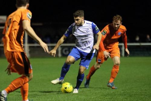 Enfields John Kyriacou and Leistons Patrick Brothers (R)