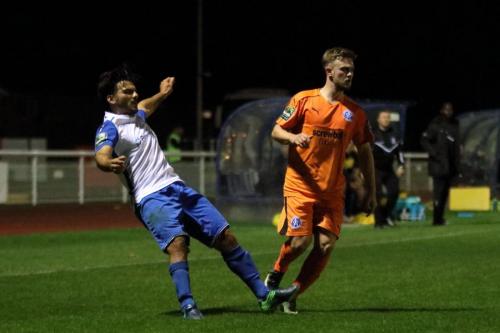 Enfields Mario Noto (L) and Leistons ( ) Regan Pelling