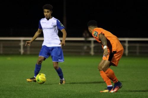 Enfields Montell Moore (L) and Leistons Seb Dunbar