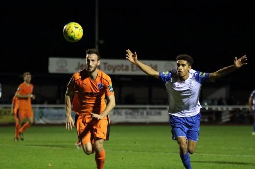 Enfields Montell Moore appeals in vain  for a handball against Joe Marsden (L)