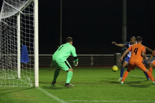 Enfields Simon Thomas (white) cant quite make contact