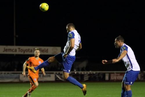 Enfields Taylor McKenzie heads across goal