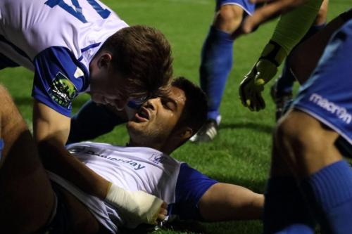 Enfields Taylor McKenzie receives the congratulations after his last-gasp equaliser110
